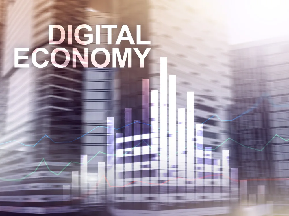 A blurred cityscape background with overlaid bar graphs and line charts, titled "Digital Economy," symbolizing financial growth and innovation.