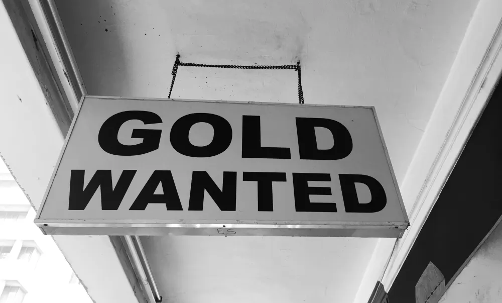 "Gold Wanted" sign