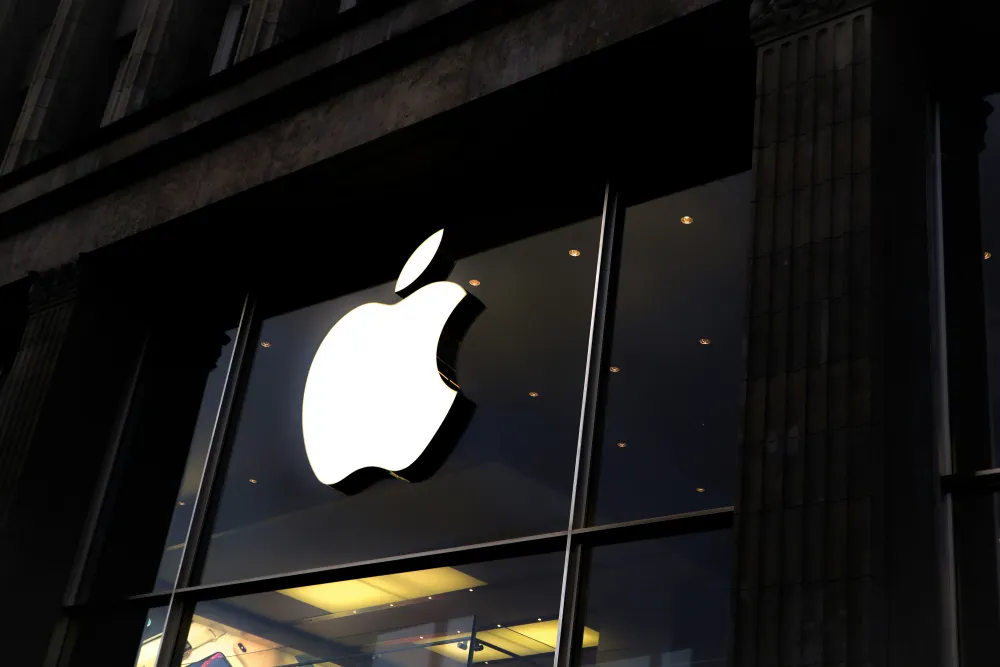 Apple logo on a black window.