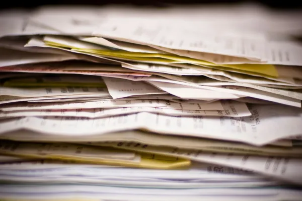 A heap of receipts and other accounting papers.