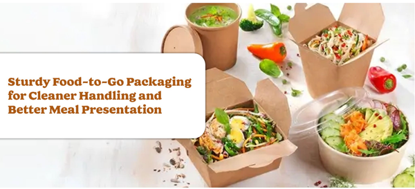 Kraft takeaway cartons, cups and bowls filled with salads and soup, surrounded by fresh vegetables