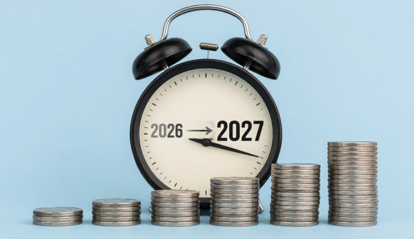Alarm clock face showing "2026" changing to "2027" behind rising stacks of silver coins